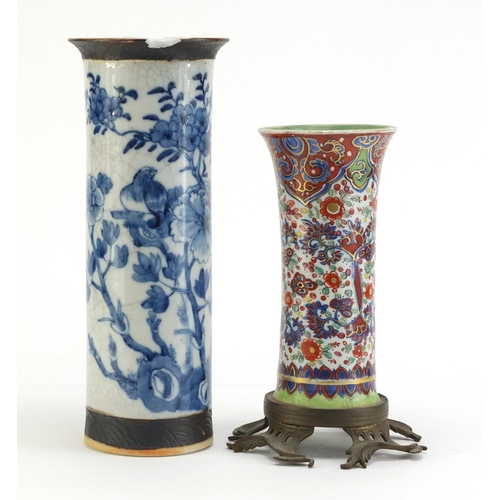 741 - Two Chinese porcelain vases hand painted with flowers, one with bronzed base, character marks to the... 