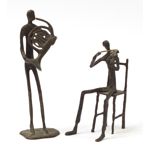182 - Two Modernist patinated bronze musicians in the style of Alberto Giacometti, 30.5cm high