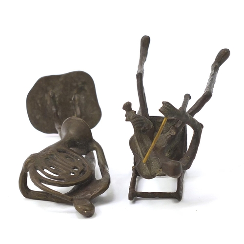 182 - Two Modernist patinated bronze musicians in the style of Alberto Giacometti, 30.5cm high