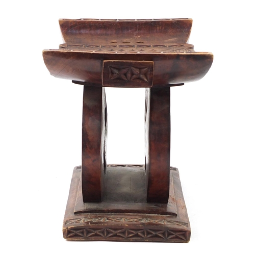 529 - Large tribal interest carved hardwood headrest, 39cm H x 57cm W x 32.5D