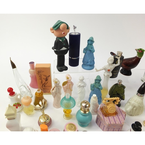 1404 - Collection of novelty Avon perfume bottles, some with boxes, the largest 23.5cm high