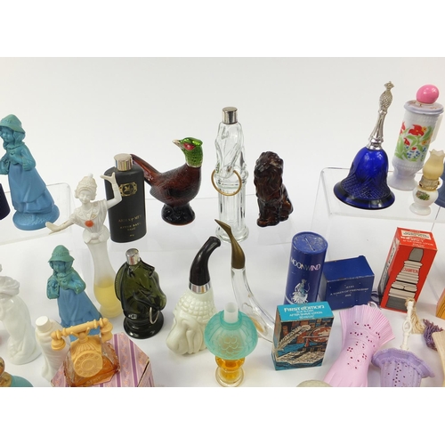 1404 - Collection of novelty Avon perfume bottles, some with boxes, the largest 23.5cm high