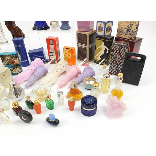 1404 - Collection of novelty Avon perfume bottles, some with boxes, the largest 23.5cm high