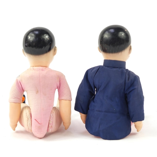 716 - Pair of Chinese composite dolls with jointed limbs, each 38cm high