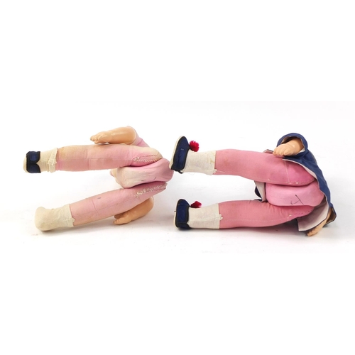 716 - Pair of Chinese composite dolls with jointed limbs, each 38cm high