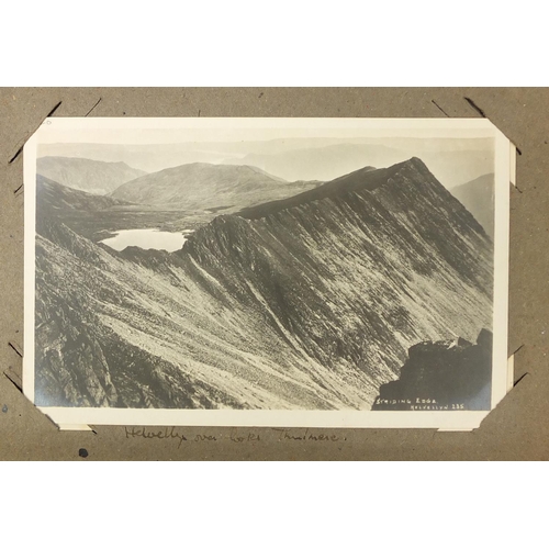 1310 - Edwardian and later topographical postcards, mostly of Keswick arranged in an album, including some ... 