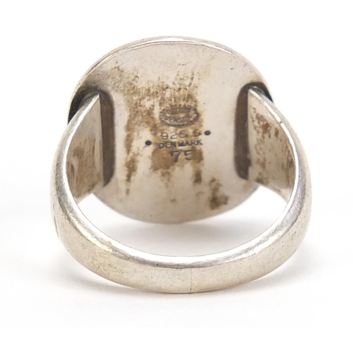 1107 - Danish 925S silver ring by Georg Jensen, decorated with a crane and numbered 75, size L, 7.2g