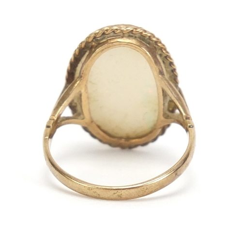 598 - 9ct gold cabochon opal ring, size O, 3.5g