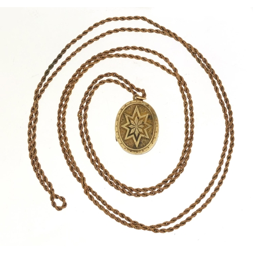 1298 - Masonic interest gold plated locket on a gilt metal long guard chain, 140cm in length