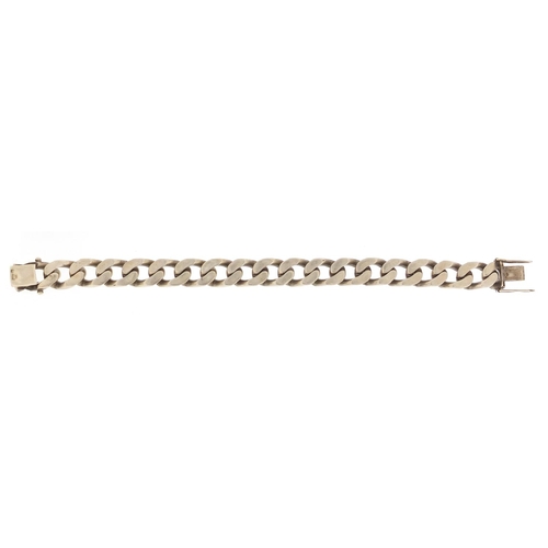 439 - Heavy gentleman's silver curb link bracelet, 21cm in length, 71.8g