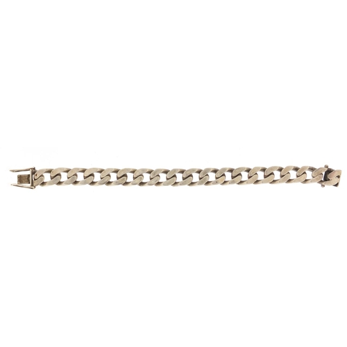 439 - Heavy gentleman's silver curb link bracelet, 21cm in length, 71.8g