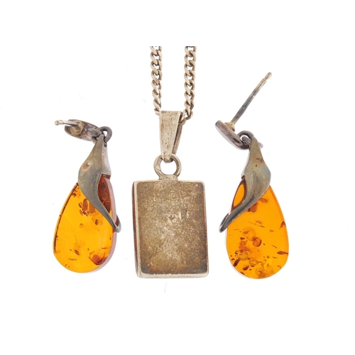 1391 - Silver and amber pendant on chain with matching earrings, the earrings 3cm in length, 8.0g