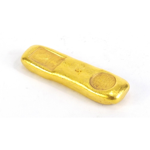 1153 - Chinese gold coloured metal ingot, impressed marks, 9.5cm wide