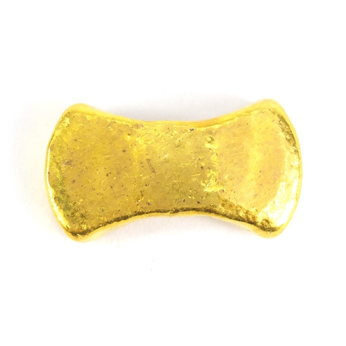 314 - Chinese gold coloured metal ingot, impressed marks, 6cm wide