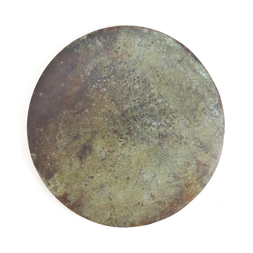 1360 - Chinese patinated bronze archaic style hand mirror, 12cm in diameter