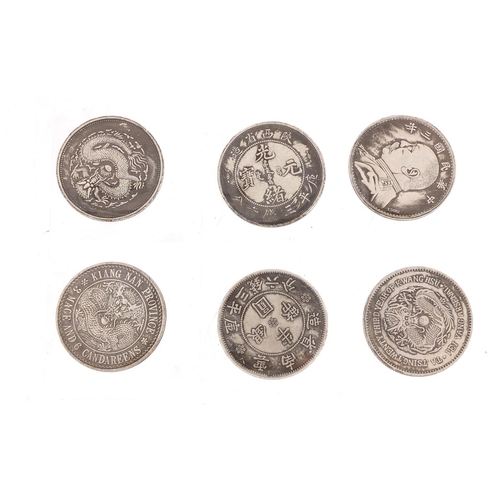 1311 - Six Chinese silver coloured metal coins