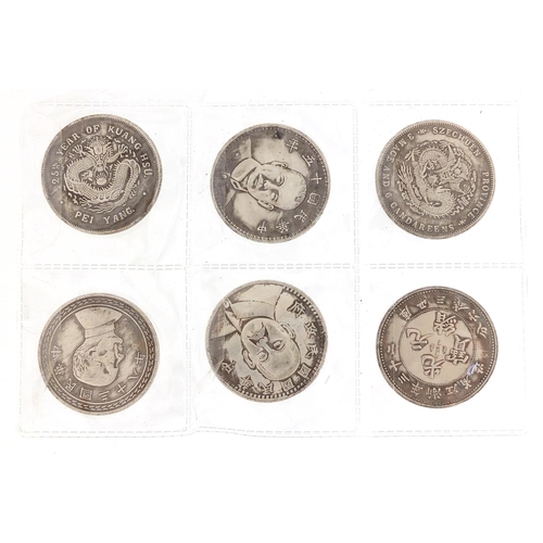 1250 - Six Chinese silver coloured metal coins