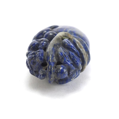 792 - Chinese lapis lazuli pendant carved with a dragon, 6cm high