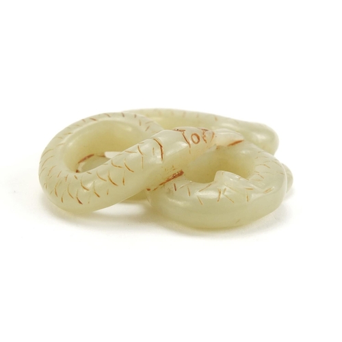 1445 - Chinese pale green jade carving of a serpent, 5.5cm wide