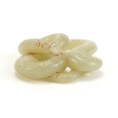 1445 - Chinese pale green jade carving of a serpent, 5.5cm wide