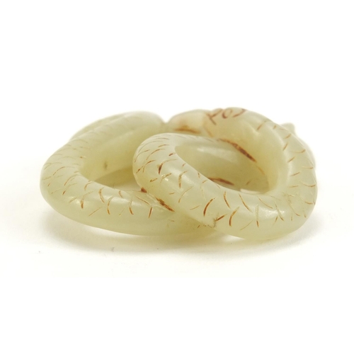 1445 - Chinese pale green jade carving of a serpent, 5.5cm wide