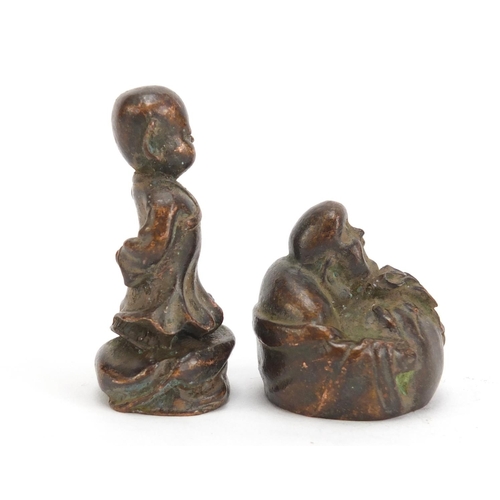 1332 - Two Chinese patinated bronzes comprising a young boy and Buddha, the largest 5cm high