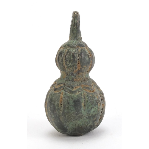 526 - Chinese archaic style patinated bronze double gourd weight, 7.5cm high