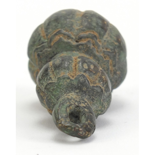 526 - Chinese archaic style patinated bronze double gourd weight, 7.5cm high