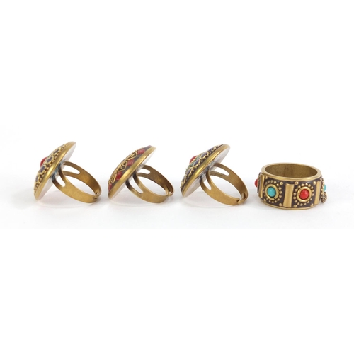 1258 - Four Tibetan rings set with turquoise and coral