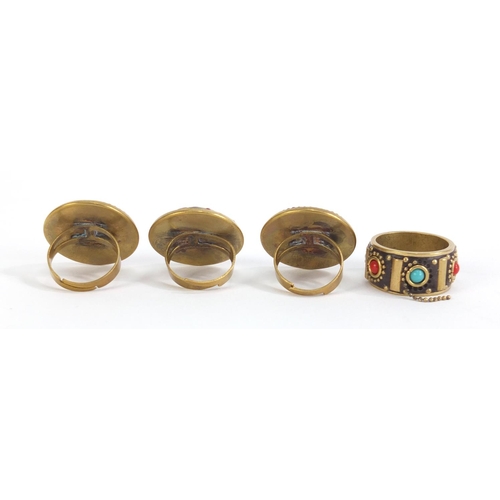 1258 - Four Tibetan rings set with turquoise and coral