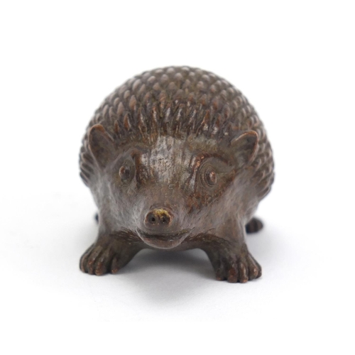 1475 - Japanese patinated bronze hedgehog, impressed marks to the base, 5.5cm in length