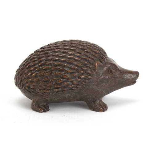 1475 - Japanese patinated bronze hedgehog, impressed marks to the base, 5.5cm in length