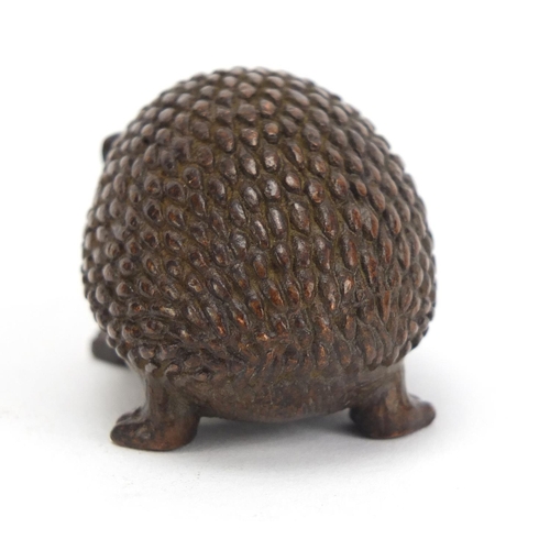 1475 - Japanese patinated bronze hedgehog, impressed marks to the base, 5.5cm in length