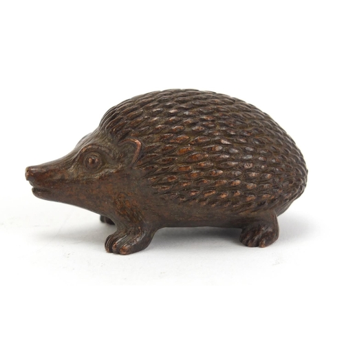 1475 - Japanese patinated bronze hedgehog, impressed marks to the base, 5.5cm in length