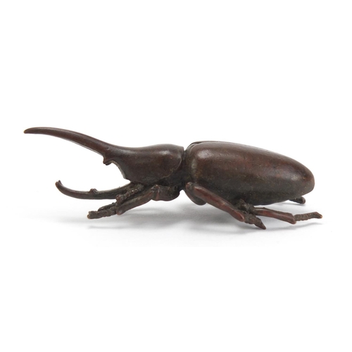 236 - Japanese patinated bronze long horn beetle, impressed marks to the base, 8.5cm in length