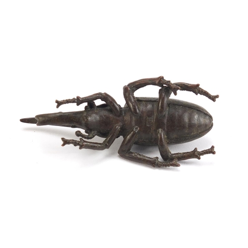 236 - Japanese patinated bronze long horn beetle, impressed marks to the base, 8.5cm in length