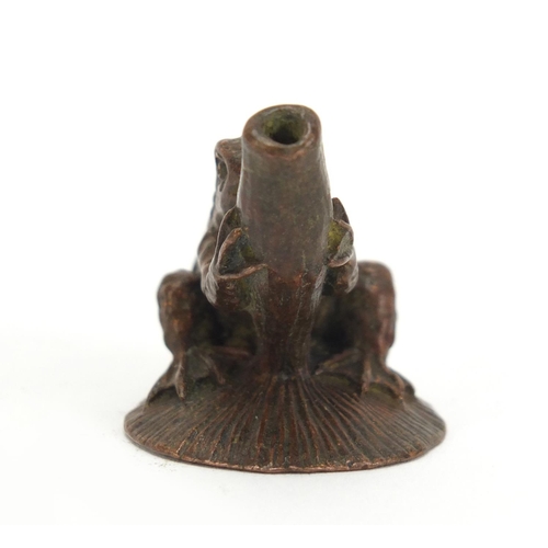 635 - Japanese patinated bronze toad, impressed character marks to the base, 3cm high