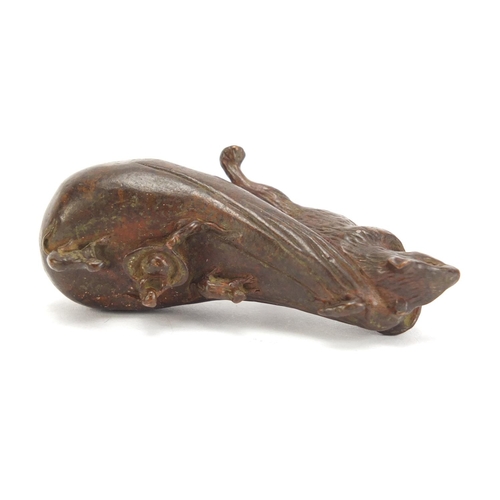 746 - Japanese patinated bronze rat pulling a sack, impressed character marks to the base, 7cm in length