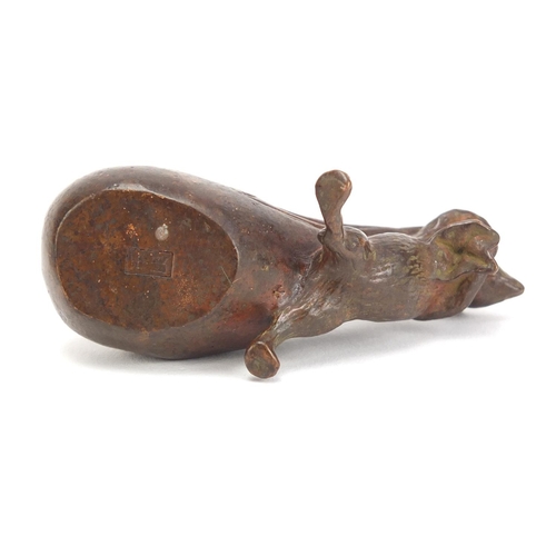 746 - Japanese patinated bronze rat pulling a sack, impressed character marks to the base, 7cm in length