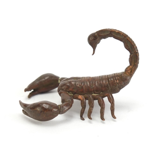 400 - Japanese patinated bronze scorpion, impressed marks to the base, 5.5cm in length