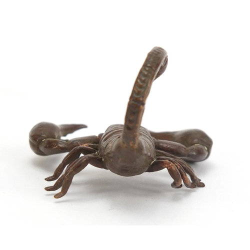 400 - Japanese patinated bronze scorpion, impressed marks to the base, 5.5cm in length