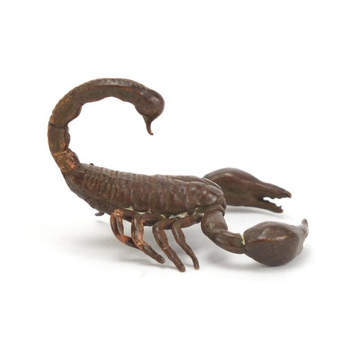 400 - Japanese patinated bronze scorpion, impressed marks to the base, 5.5cm in length