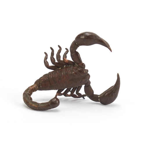 400 - Japanese patinated bronze scorpion, impressed marks to the base, 5.5cm in length