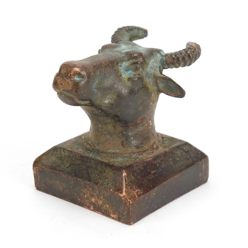 836 - Chinese patinated bronze cow's head design seal with character marks, 4cm high