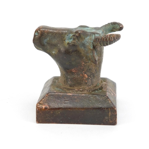 836 - Chinese patinated bronze cow's head design seal with character marks, 4cm high