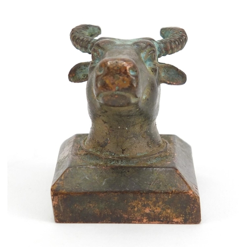 836 - Chinese patinated bronze cow's head design seal with character marks, 4cm high