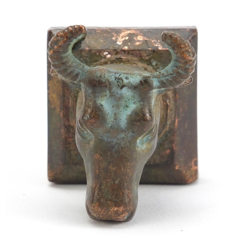 836 - Chinese patinated bronze cow's head design seal with character marks, 4cm high