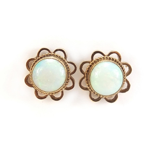 319 - Pair of 9ct gold opal earrings, 1cm in diameter, 2.0g