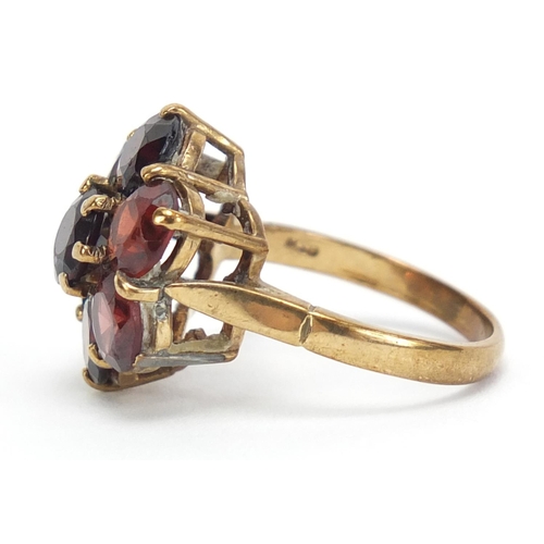 177 - 9ct gold garnet cluster ring, size O, 5.3g