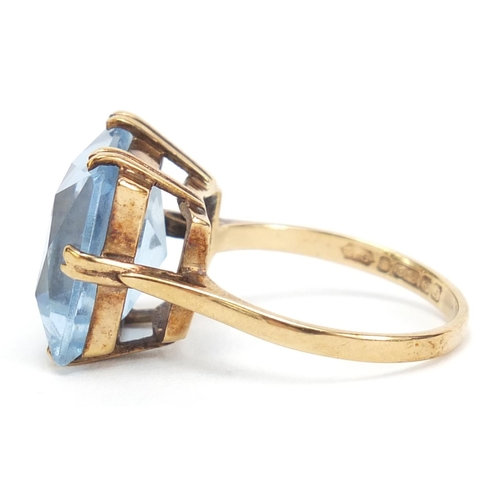 146 - 9ct gold blue stone ring, size P, 5.6g